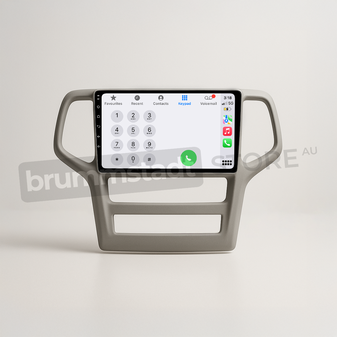 Brummstadt head unit for Jeep Grand Cherokee 2008-2013, grey frame with a large touchscreen, Apple CarPlay interface displaying contacts, keypad, and WhatsApp icon, designed for enhanced connectivity and navigation in the Jeep Grand Cherokee.
